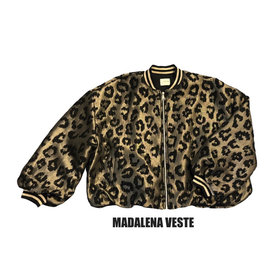 · Madela Veste ·